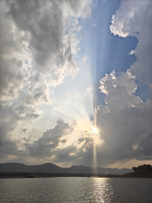 Sunlight piercing the clouds